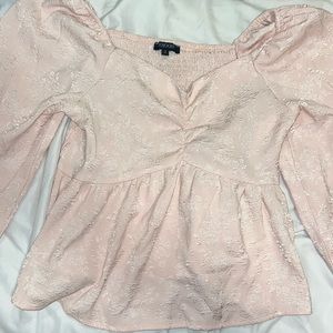 Pink blouse with puff arms